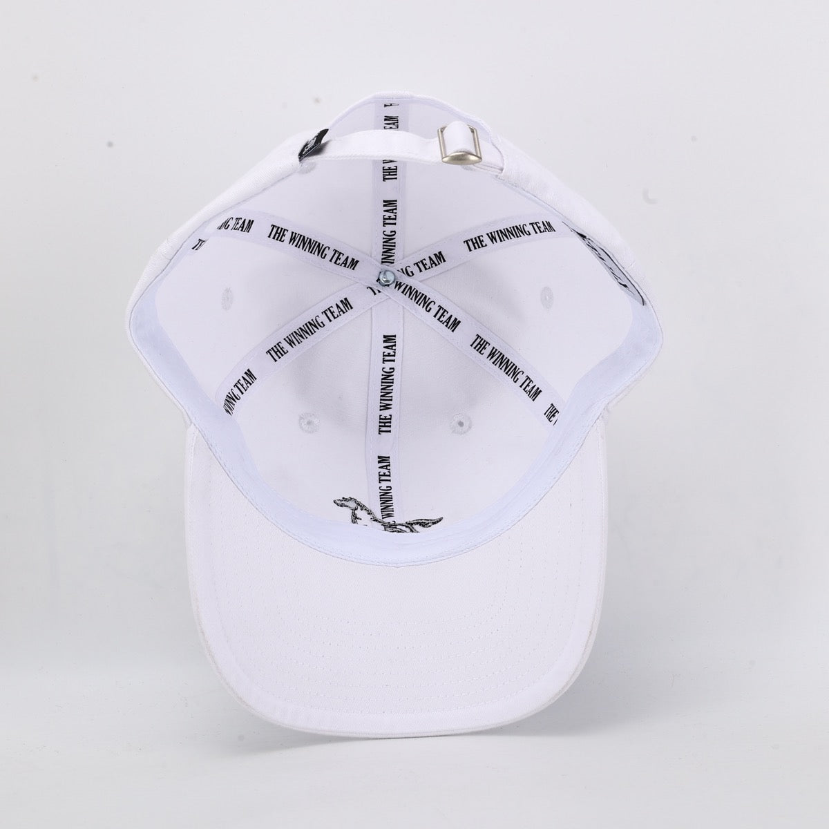 White cap with black text and logo on a light gray background