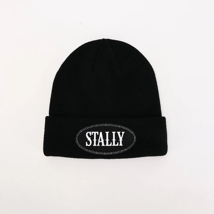 Black beanie with 'STALLY' logo on a white background