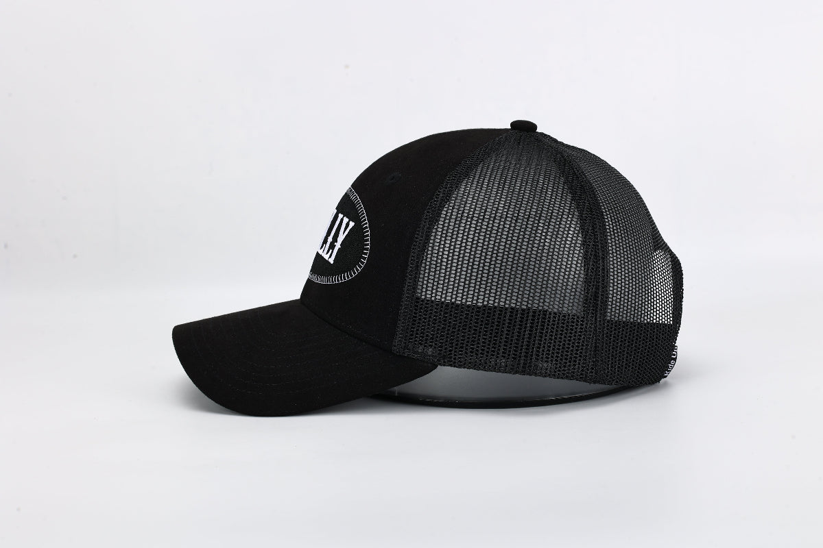 Stally Black Mesh Western Trucker Hat Being Worn