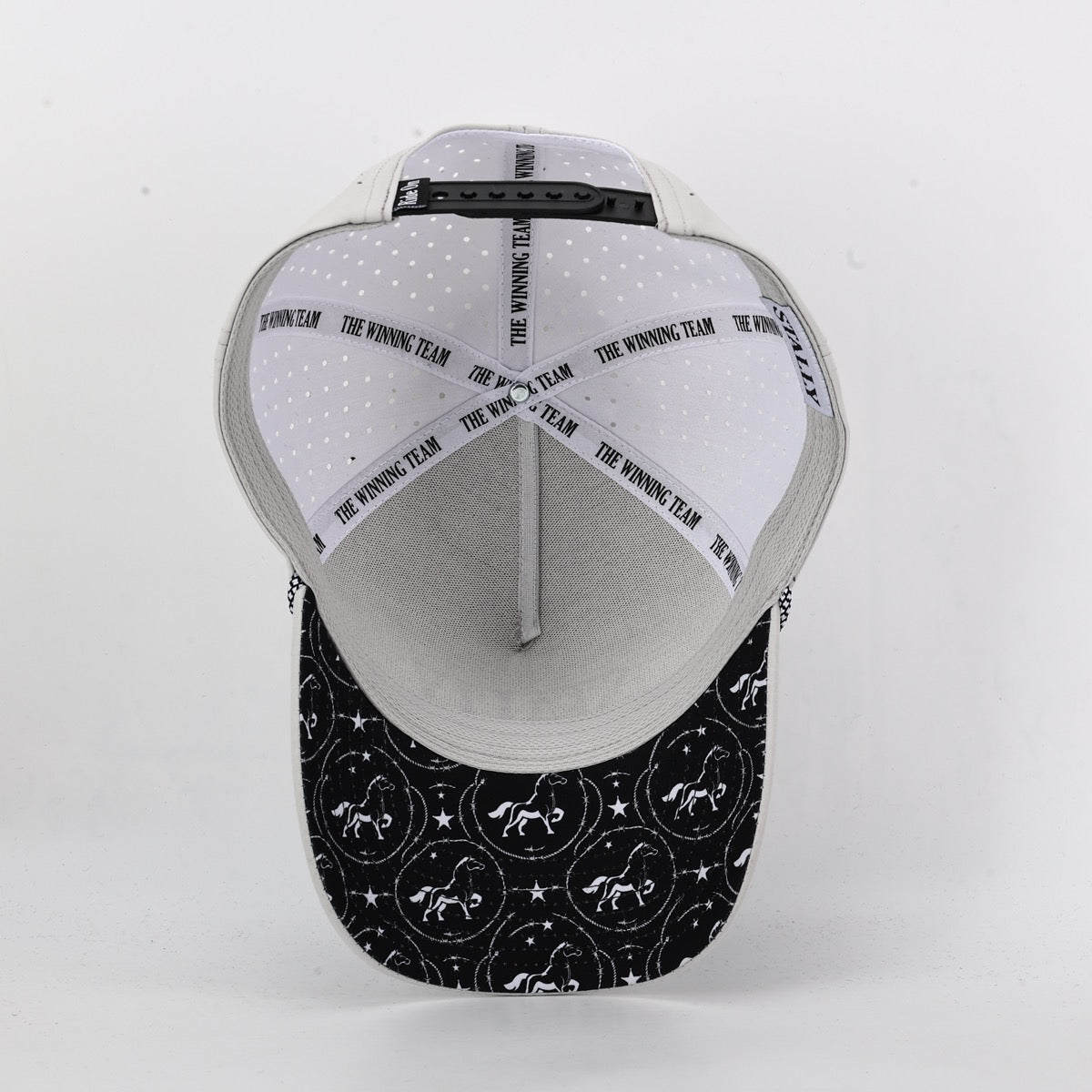 Baseball cap with patterned front and white back on a light gray background