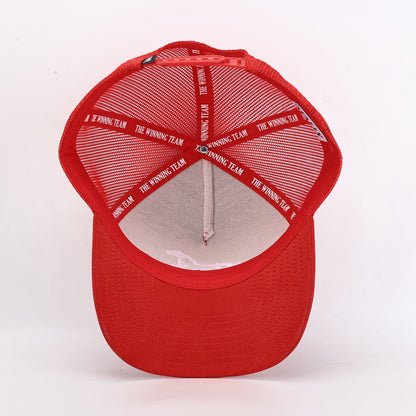 Red cap with 'The Winning Team' branding on a white background