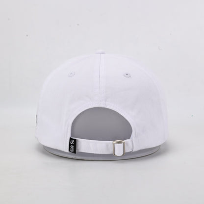 White cap with gray brim on a light gray background